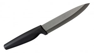 Black ceramic knife isolated on white background with clipping path